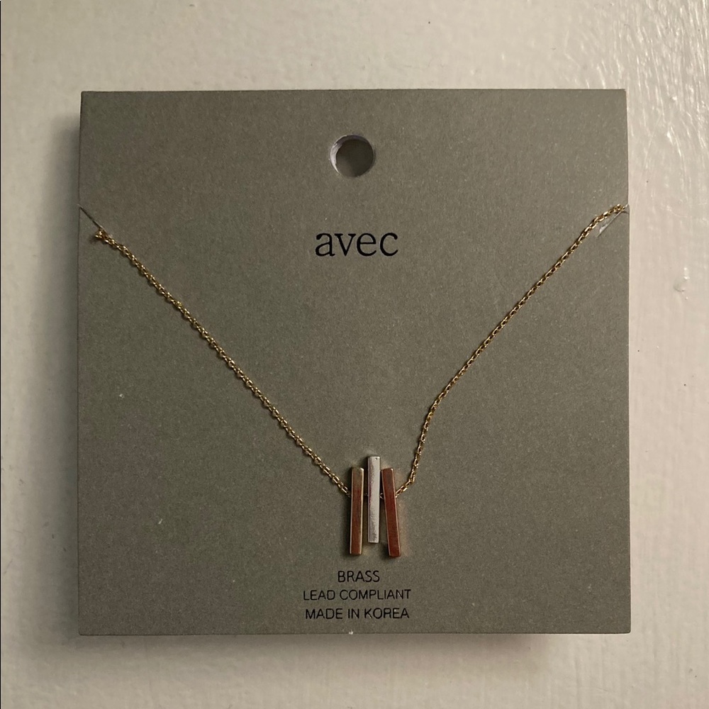 Silver/brass/gold bar necklace.